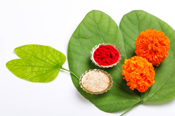 istock Happy Dussehra greeting card , green leaf and rice 1171496640