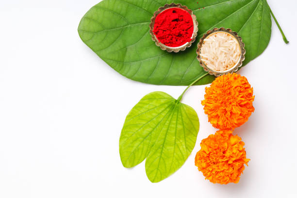 istock Happy Dussehra greeting card , green leaf and rice 1171496676
