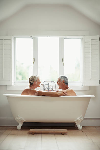 istock Romantic, mature couple having fun in a bathtub 117149688