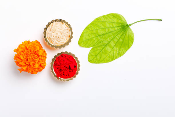 istock Happy Dussehra greeting card , green leaf and rice 1171497241