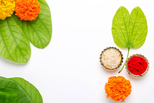 istock Happy Dussehra greeting card , green leaf and rice 1171497265