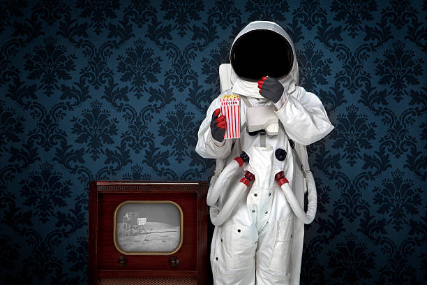 Astronaut Watching Moon Landing http://dieterspears.com/istock/links/button_space.jpg cosmonaut stock pictures, royalty-free photos & images