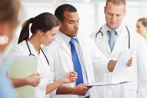istock Serious doctors are looking at the patients results 117149806