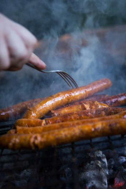 istock The chef checks that the sausages are done 1171500820