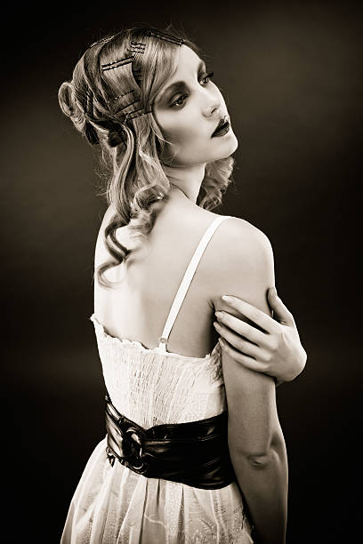 istock Pretty Blond Woman on dark background 117150105