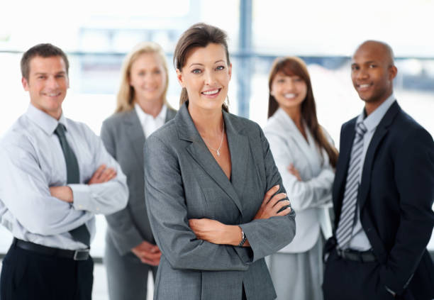 istock Attractive business woman with her team 117150246