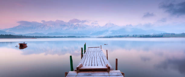 istock tranquil scene with boat at lake hopfensee 117150256