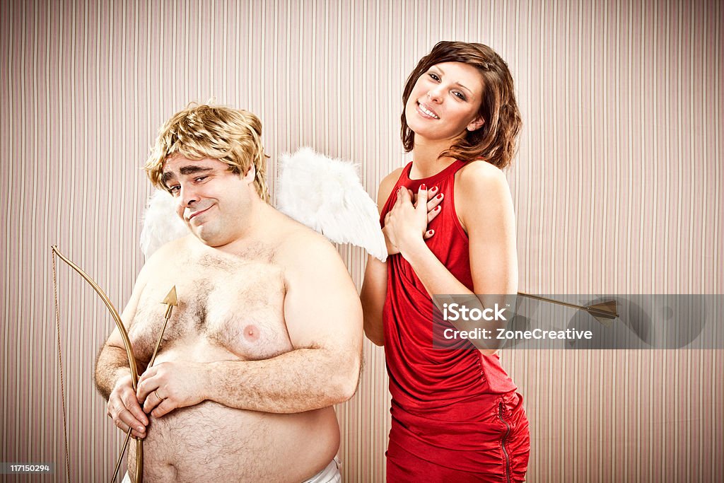 wise cupid fall in love with beautiful girl  Couple - Relationship Stock Photo