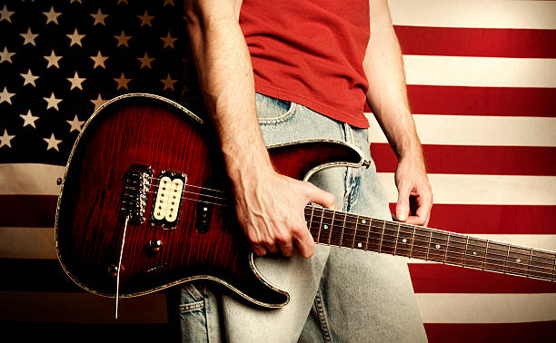 istock Guitarist with American flag background. 117150425