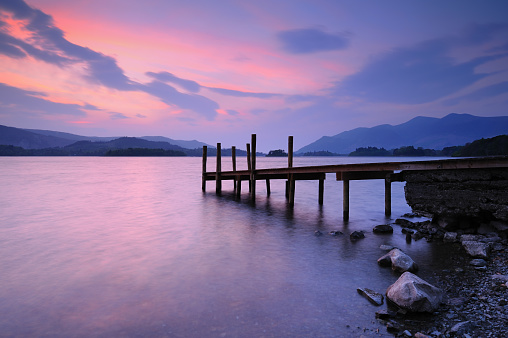 Wide angle view of sunset from the shores at Ashness Landing on Derwent Water in the Lake District National Park. XL image size, left unsharpened.