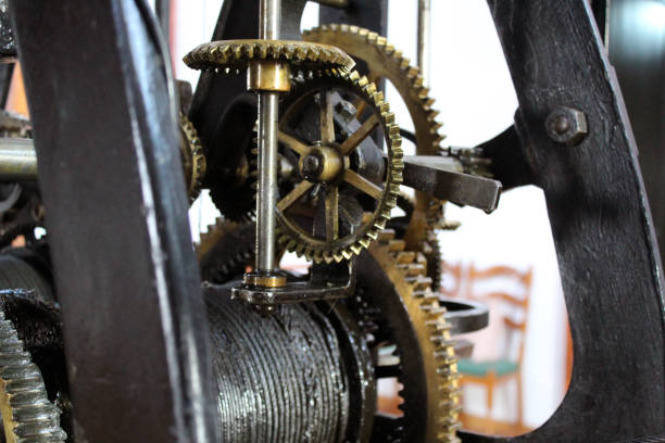 istock Old clock mechanism gears and cogs close up 1171505180