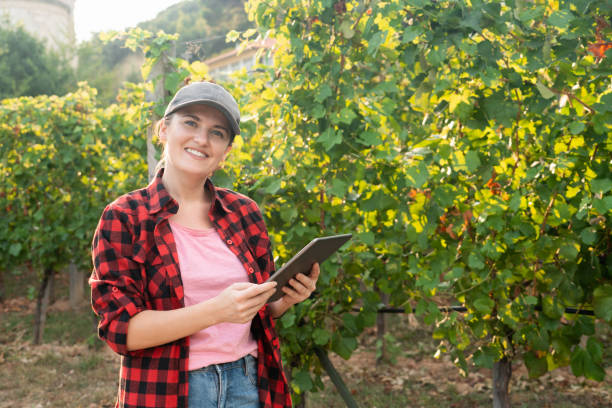 istock A woman farmer with digital tablet. 1171505225