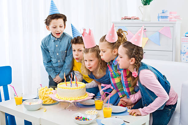istock Blowing out birthday candles 117150586