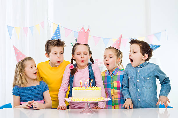 istock Blowing out birthday candles 117150593