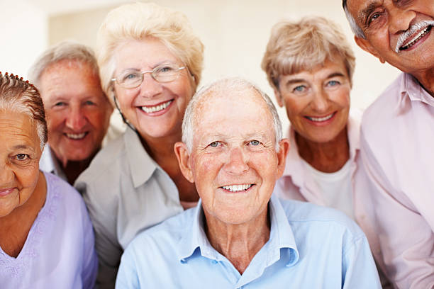 istock Group of senior people smiling 117150602