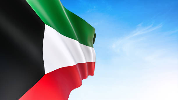 istock Kuwait flag waving in blue sky 1171506352