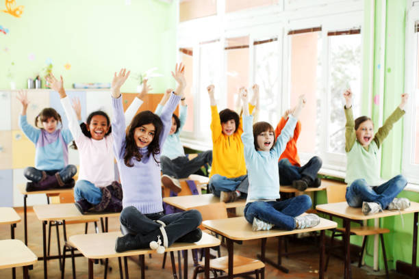 istock Cheerful children are having a fun at the school. 117150681