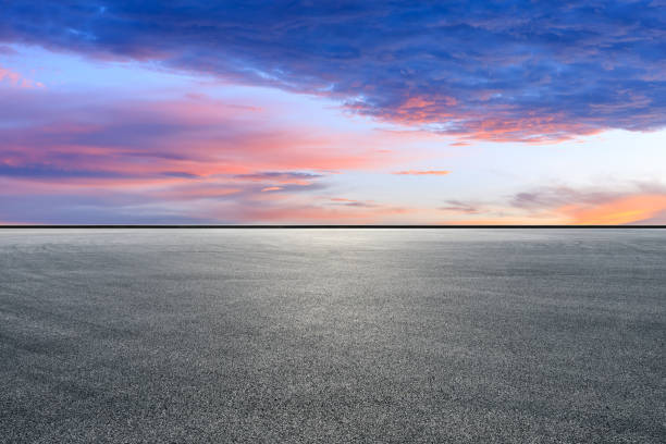 istock Race track road and beautiful sky clouds at sunset 1171507475