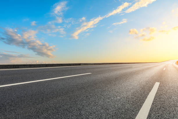 istock Asphalt highway and beautiful sky clouds at sunset 1171507536
