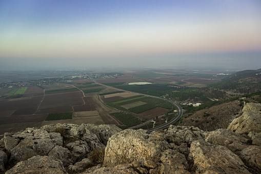 Morning view at morning sunrice from Mount Precipice on a nearby valley near Nazareth in Israel