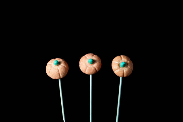 istock Various typical halloween sweets on a black background. Useful as a background for commercial purposes 1171508913