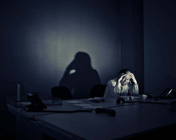 istock stressed businessman sitting alone in his office 117150950