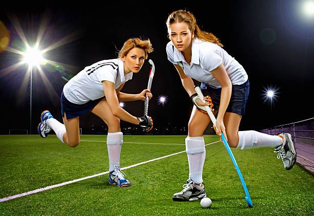 istock two women playing field hockey 117150988