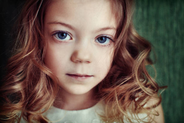 Unearthly girl with big blue eyes. One in a million. stock photo