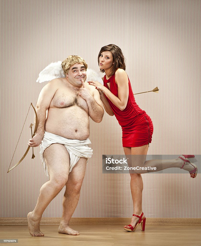 Tímido cupid Apaixone-se pela bela garota - Foto de stock de Cupido royalty-free