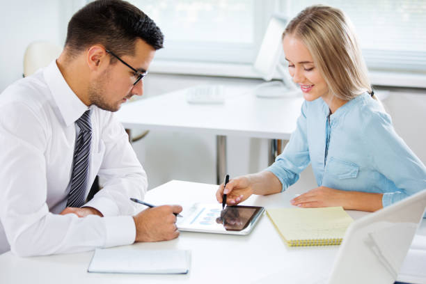 istock Business people working in an office 1171511132