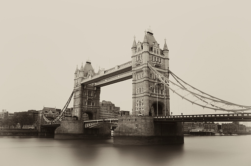 One minute time exposure shot of the famous Tower Bridge, London. Sepia toned.