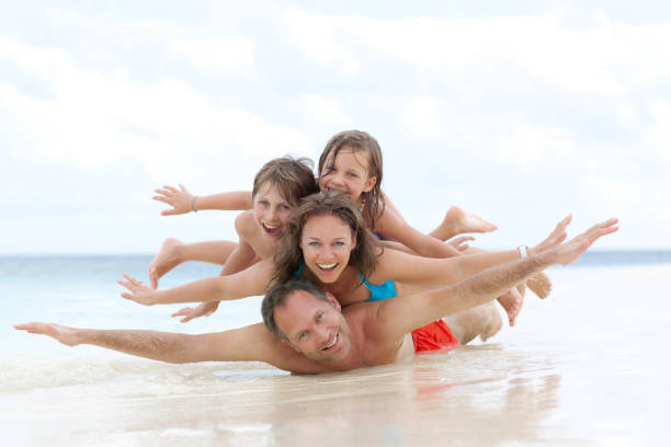 istock happy family lying upon each other 117151190