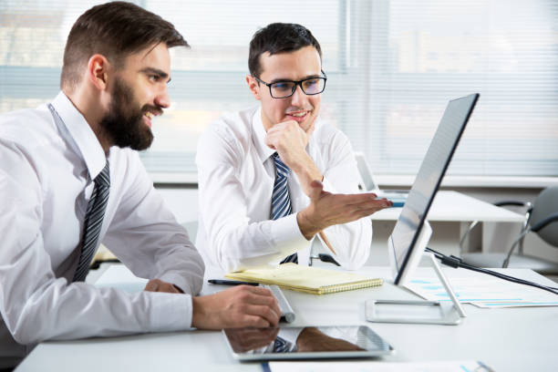 istock Young businessmen at office 1171511933