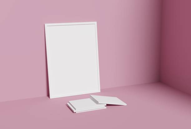 istock One empty photo frame and book for mockup in empty pink room, 3D render, 3D illustration 1171511998