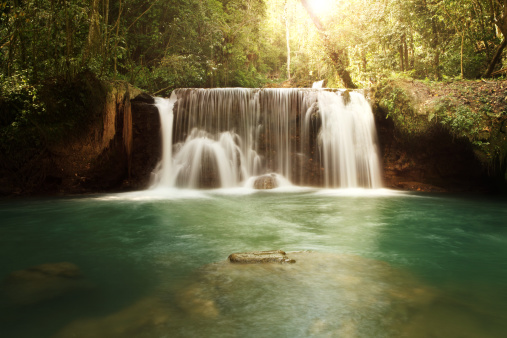 Scenic aerial view of refreshing  Kuang Si waterfall in the jungles