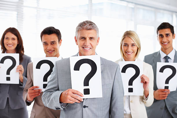 istock Business people with question mark on placards 117151313