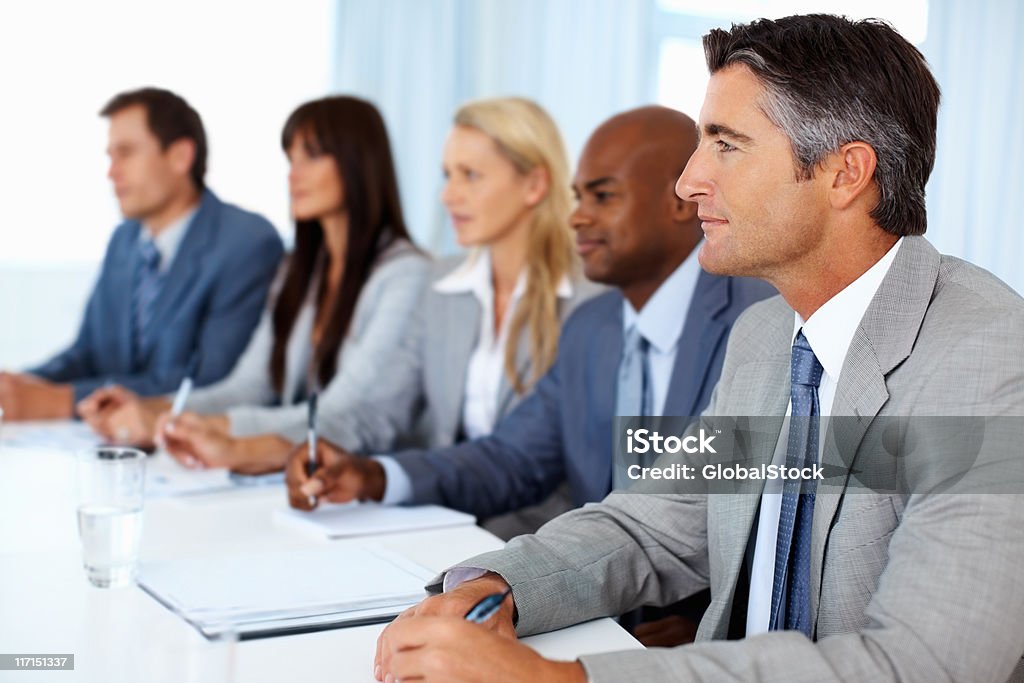 People concentrating at business presentation  Adult Stock Photo