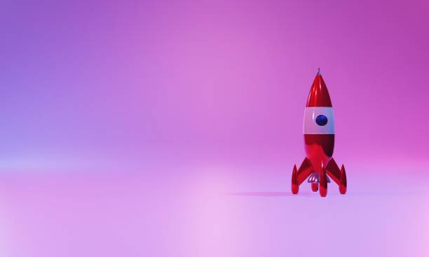 istock A toy rocket on a bright background illuminated by a neon color. 3d rendering 1171513530