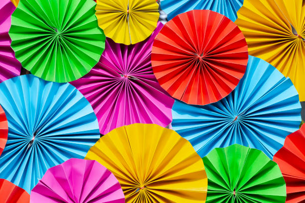 Colorful paper flowers texture or background.