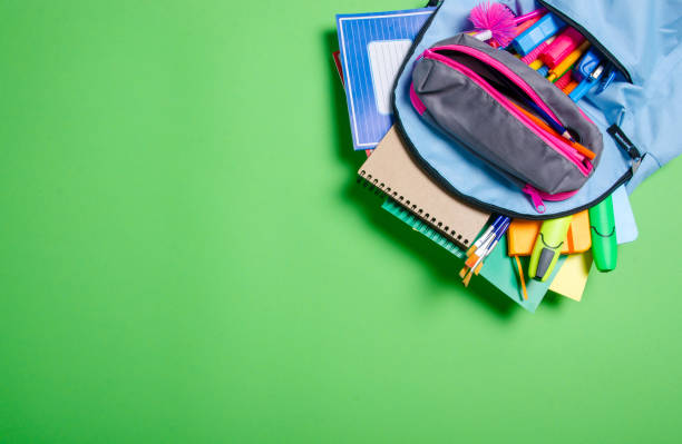 istock Back to school concept. Blue backpack with school supplies 1171519107