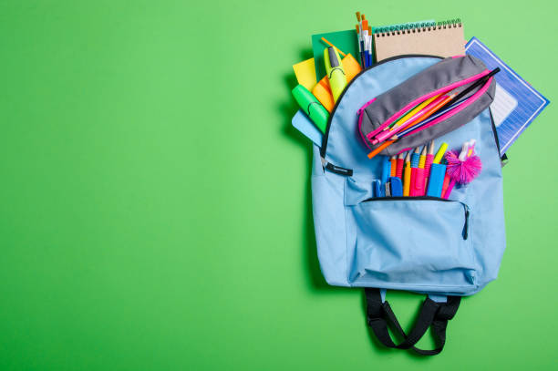 istock Back to school concept. Blue backpack with school supplies 1171519128
