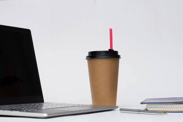istock work office desk with a cup of coffee computer laptop, notebook, pen 1171520008