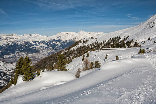 Picturesque winter landscape, ski slope in the Alps, ski area 4 valleys, Switzerland