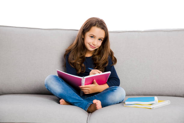 istock LIttle girl studying 1171525442