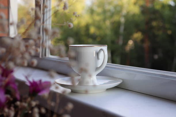 istock cup of coffee on the windowsill 1171525637