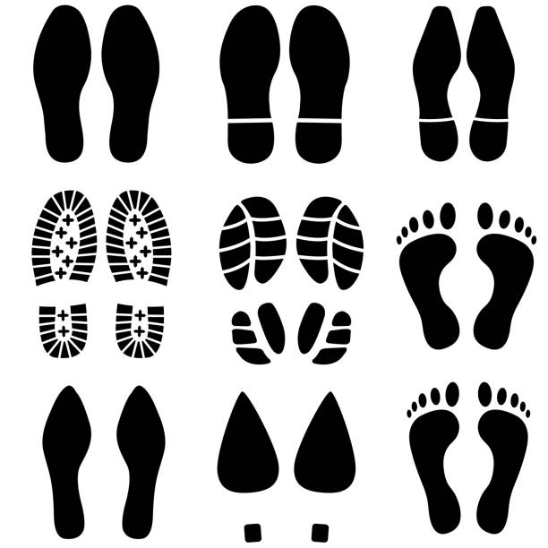 Set footprints men, women, sneakers, shoes, boots icon, isolated on white background Set footprints men, women, sneakers, shoes, boots icon, isolated on white background sole of shoe stock illustrations