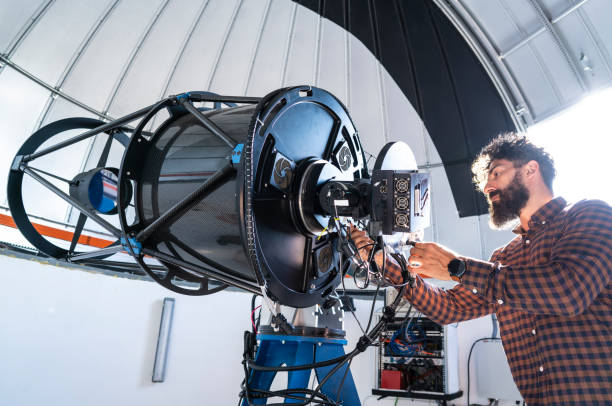 istock Astronomer in photo telescope dome 1171530261