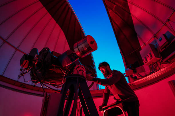 istock Astronomer in photo telescope dome 1171530349