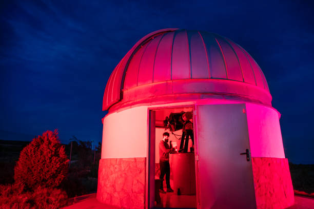 istock Astronomer in photo telescope dome 1171530386