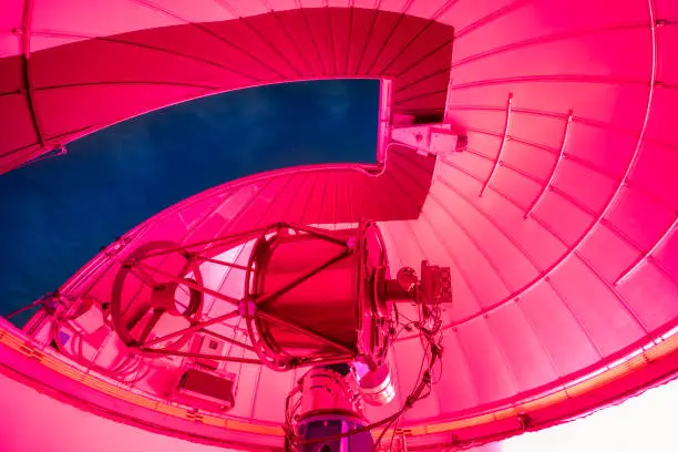 Photo of Astronomy telescope at indoor dome